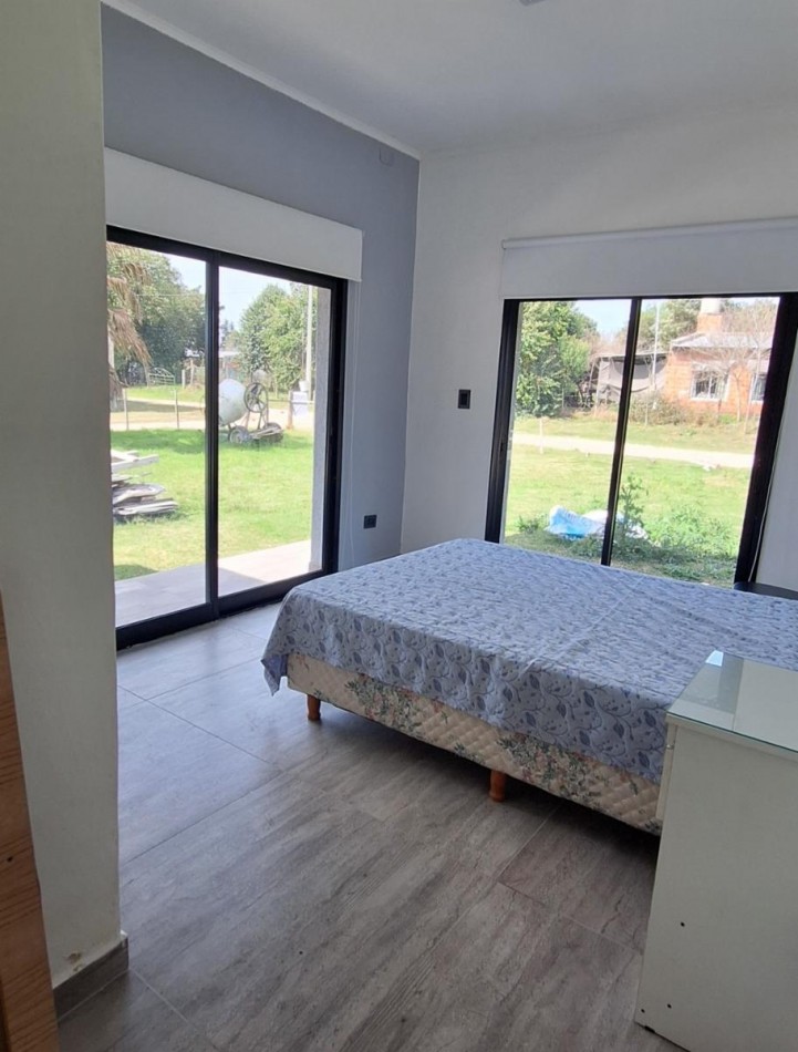 Venta lote en esquina Antelo, casa a estrenar con pileta