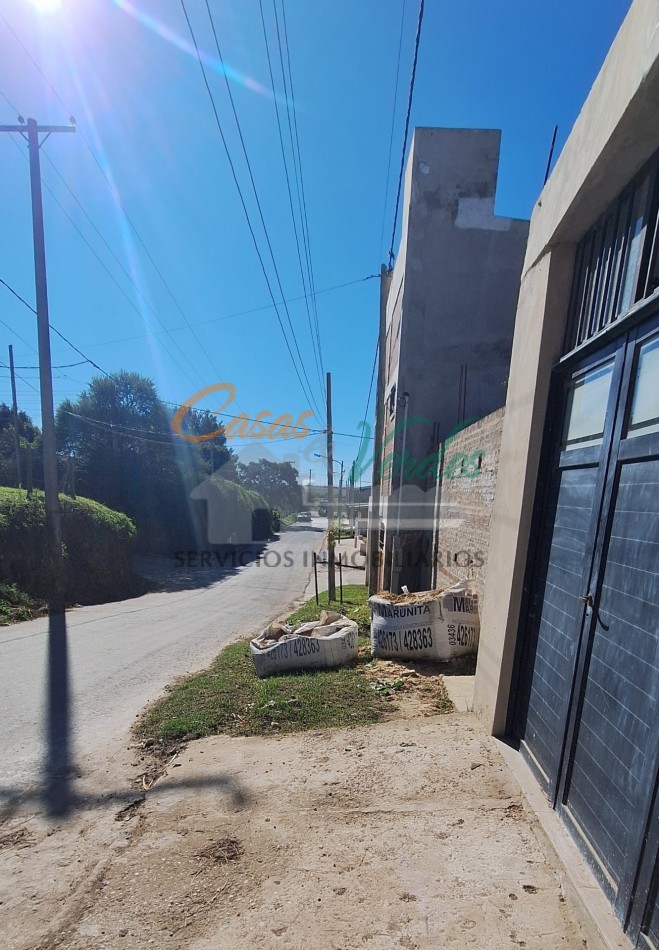 Venta Lote con construccion, cochera terminada, cimientos, calle asfaltada