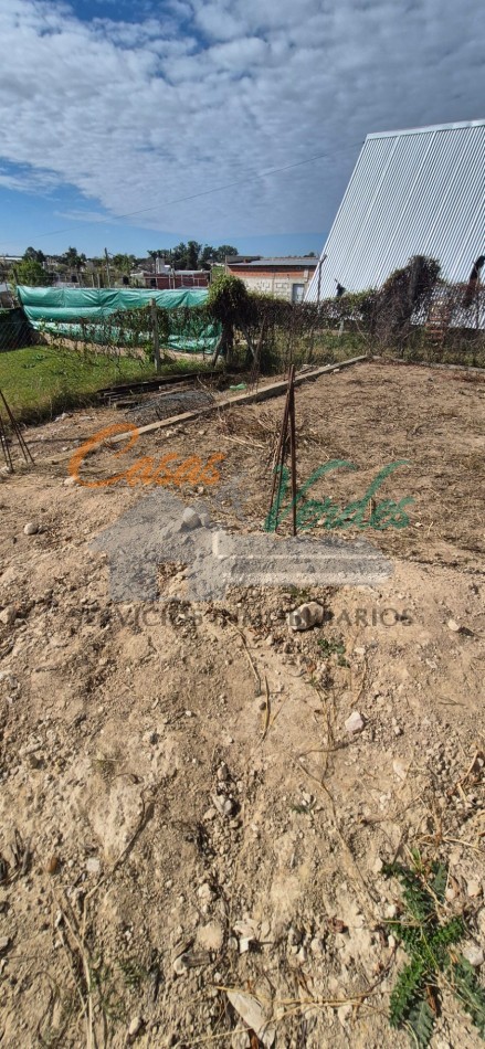 Venta Lote con construccion, cochera terminada, cimientos, calle asfaltada
