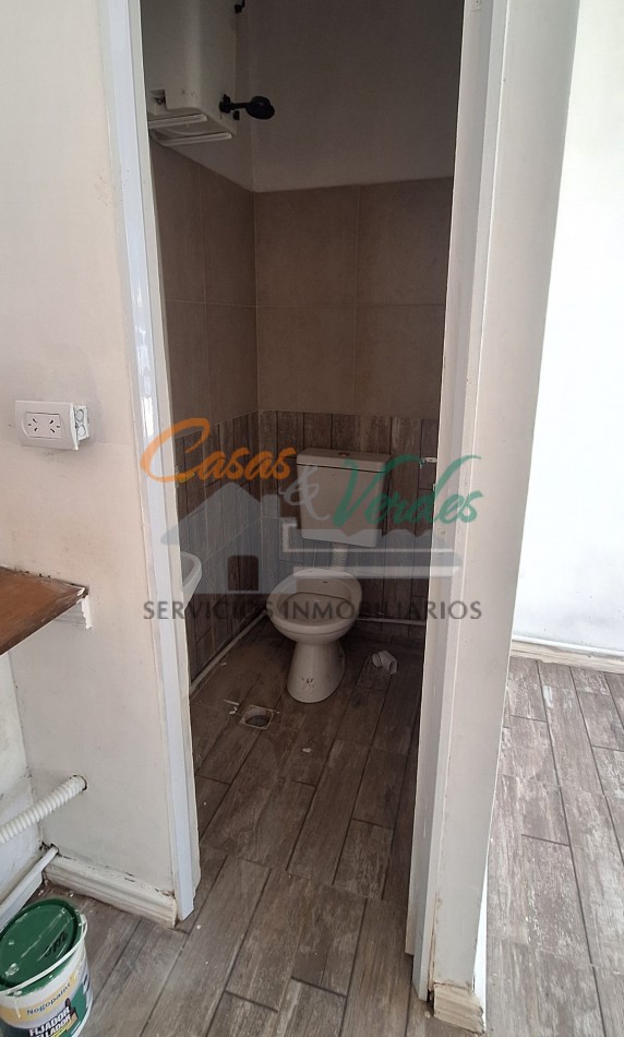 Venta Lote con construccion, cochera terminada, cimientos, calle asfaltada