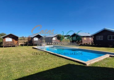 VENTA 7 cabañas, quincho salon de fiestas, pileta, gran terreno , cerca de la ciudad y ruta